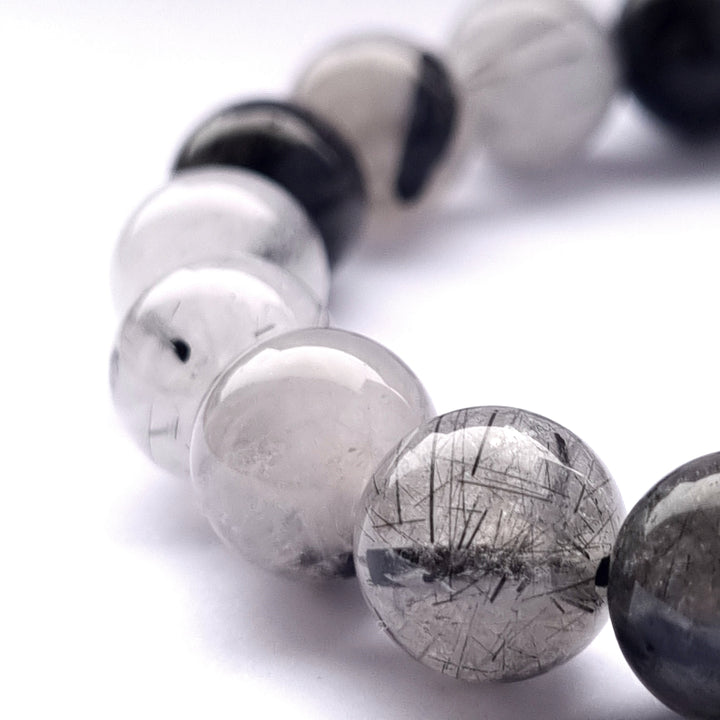 Close up of Tourmalinated quartz bracelet quartz beads