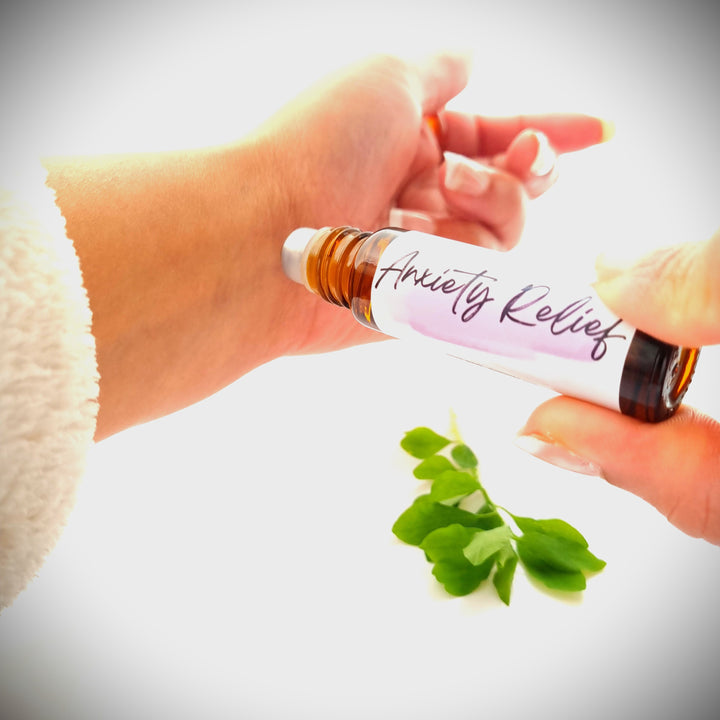 Anxiety oil being used on a wrist